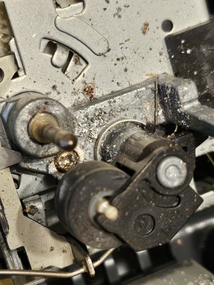 Closeup detail of the inside of a TASCAM 424mkII cassette mechanism, buildup of 