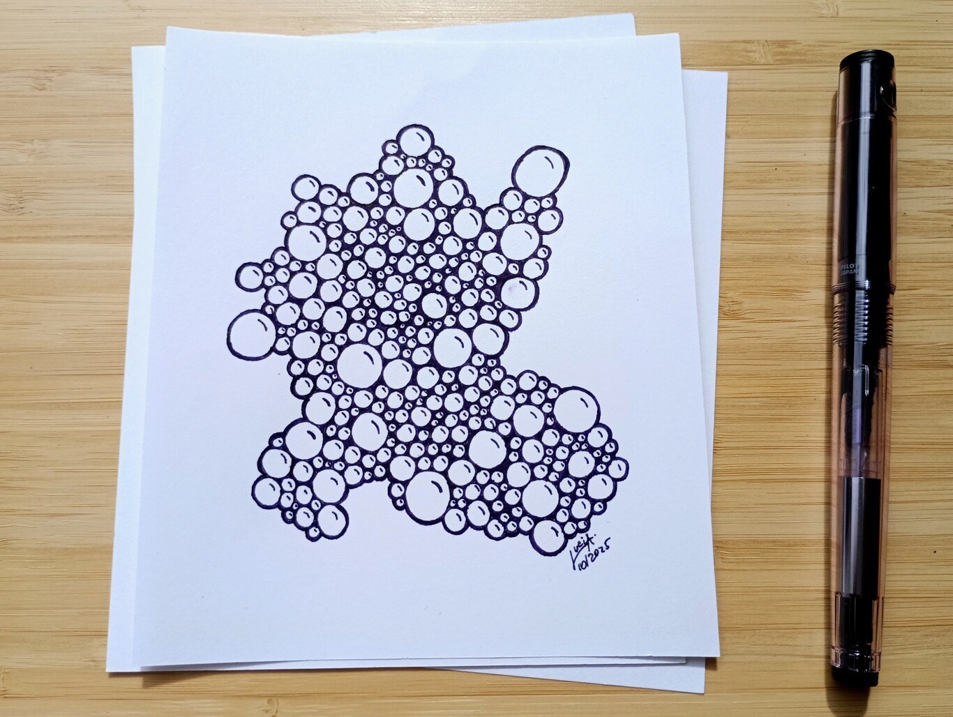 A drawing of simple bubbles grouped together.