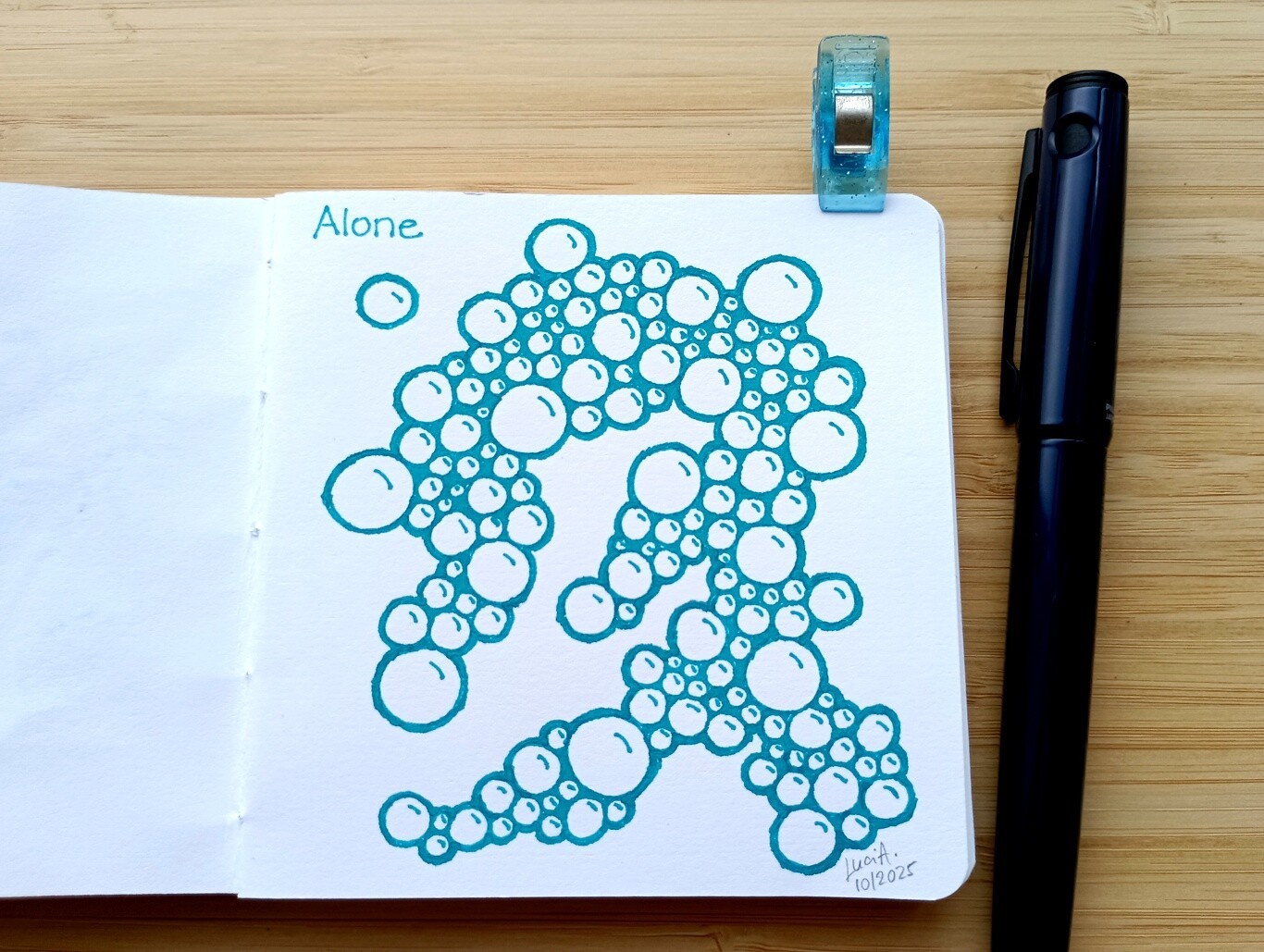 A drawing of simple bubbles grouped together with one bubble standing alone.