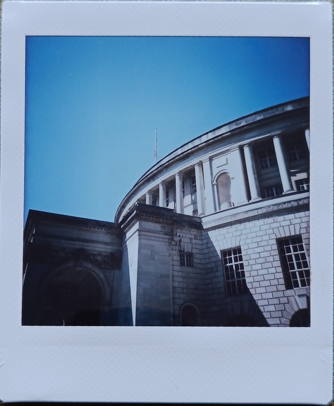 central library circle shaped with bright blue sky